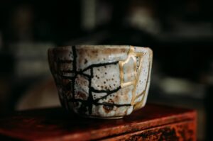 Kintsugi object showing physicians rebuilding happier