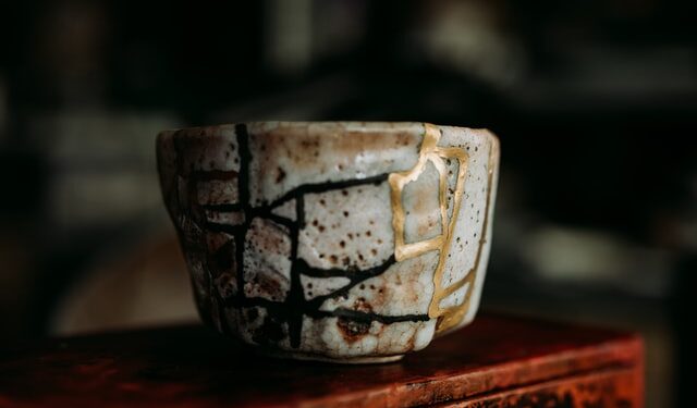 Kintsugi object showing physicians rebuilding happier