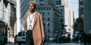 Woman walking alone on a quiet road, symbolizing doctors leaving traditional career paths.